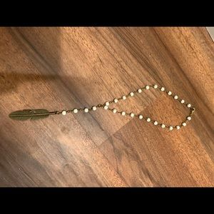 Raw and rebellious white feather necklace